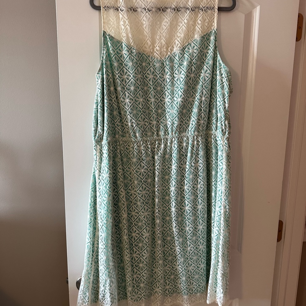 Knee length turquoise and lace overlay dress